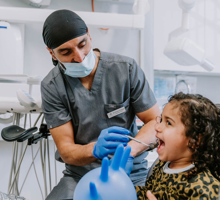 dentist with child patient