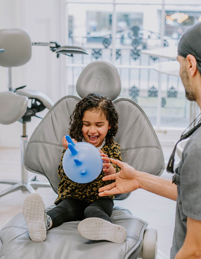 child in dental chair
