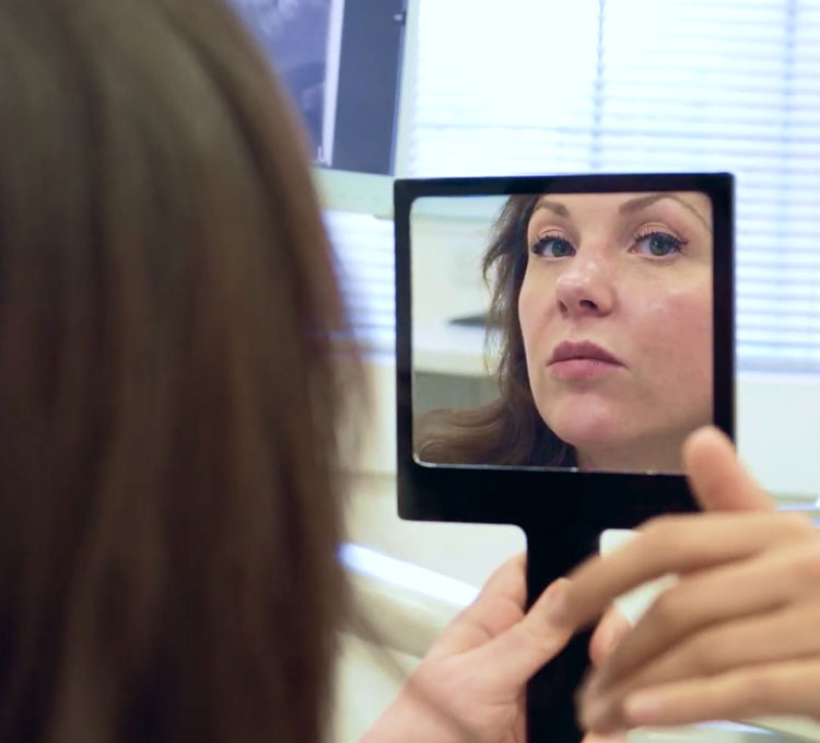 patient looking in a mirror